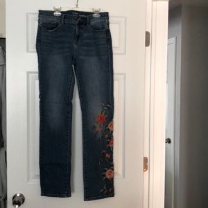 Red and pink flowers embroidered